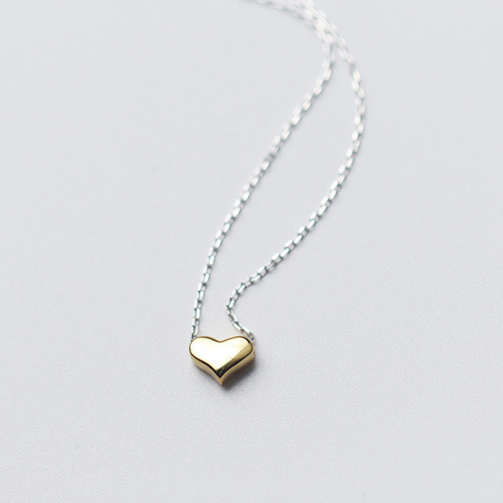 Silver Necklace with Golden Heart Pendant